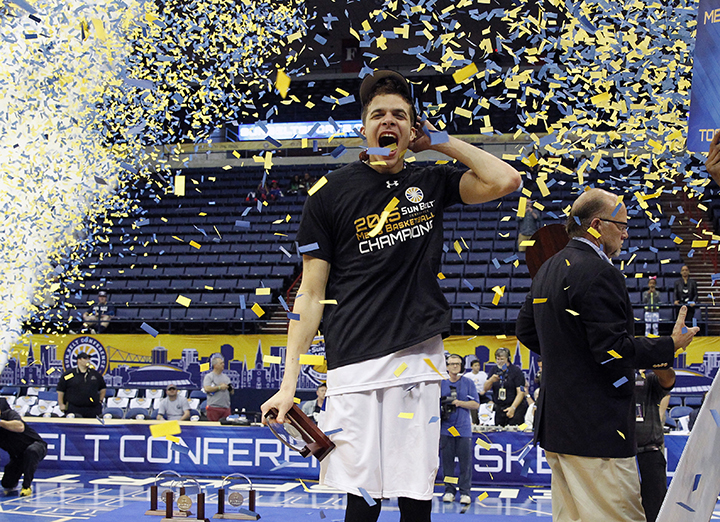 Georgia State guard R.J. Hunter (22) celebrates after defeating Georgia Southern in the Sunbelt Conference tournament in New Orleans, Sunday, March 15, 2015. Georgia State defeated Georgia Southern 38-36 for the championship. Hunter scored the final two points allowing the victory. Associated Press