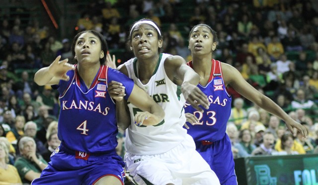 Sophomore post Khadijah Cave (55) jostles for a rebound during Baylor’s 66-58 win over Kansas on Feb. 1. The Lady Bears will take on Northwestern State in the first round of the NCAA Tournament today. Skye Duncan | Lariat Photo Editor