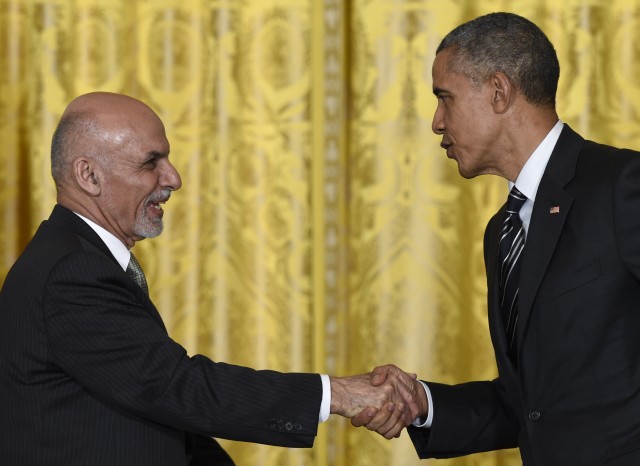 President Barack Obama talks with Afghanistan’s President Ashraf Ghani following their news conference on Tuesday in the East Room of the White House in Washington.   Associated Press