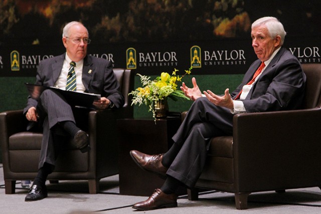 Baylor President and Chancellor Ken Starr listens to former U.S. Rep. Frank Wolf during On Topic on Wednesday at the Baylor Club lounge. The talk centered around the issue of religious freedom.  Kevin Freeman | Lariat Photographer