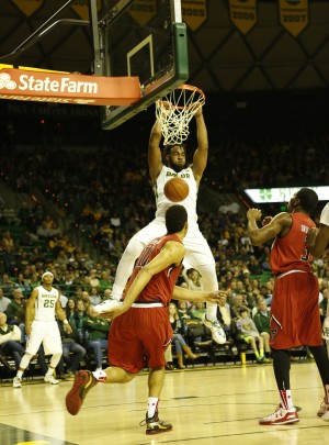 Junior forward Rico Gathers slams a ball home during No. 14 Baylor's win over Texas Tech on Friday at the Ferrell Center. File Photo
