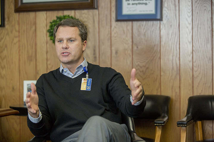 Wal-Mart President and Chief Executive Officer Doug McMillon speaks during an interview with The Associated Press on Feb. 17, in Bentonville, Ark. Wal-Mart Stores Inc. is spending $1 billion to change how it pays and trains hourly staff in a move it hopes will help reshape the image that it only offers dead-end jobs.  Associated Press