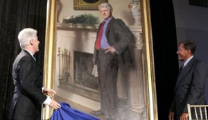 Former President Bill Clinton, left, unveils his portrait with Lawrence M. Small, secretary of the Smithsonian Institution, on April 24, 2006.