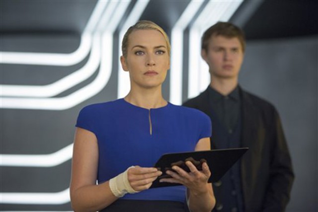 Kate Winslet plays Jeanine and Ansel Elgort, plays Caleb, in a scene from the film, “The Divergent Series: Insurgent.” The film opened Friday.  Associated Press
