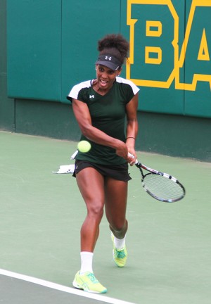 No. 82 junior Kiah Generette returns the ball Friday afternoon in the Hurd Tennis Center. The Lady Bears topped Kansas State 4-0.  Skye Duncan | Lariat Photo Editor