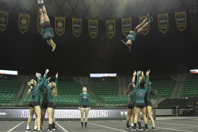 Baylor acrobatics & tumbling competes against No. 2 University of Oregon on April 13 at the Ferrell Center. The Bears won their first national championship under head coach Fee Mulkey in 2015.  Hannah Haseloff | Lariat Photographer
