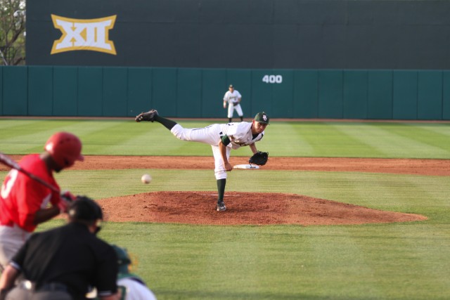 No. 33 freshman pitcher Theron Kay throws a pitch against the Houston Cougars on March 31 at Baylor Ballpark.  Skye Duncan | Lariat Photo Editor