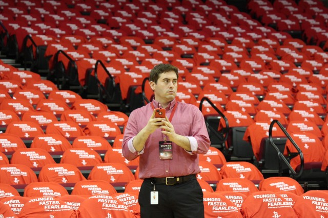 Chad Shanks stands in the Toyota Center, home of the Houston Rockets, in 2013 before a playoff game in Houston.  Courtesy Art