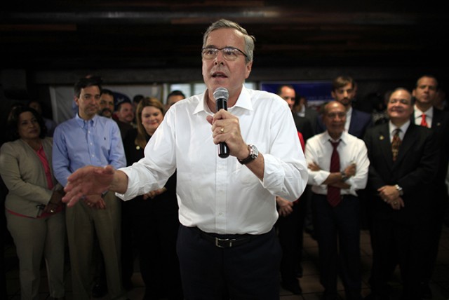 Former Florida Gov. Jeb Bush speaks during a town hall meeting Tuesday with Puerto Rico’s Republican Party in Bayamon, Puerto Rico. Republicans are bringing something unique to the 2016 presidential campaign: an ability to speak to Americans in both of their main mother tongues, Spanish as well as English.  Associated Press