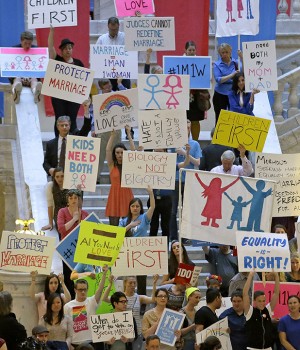 Opponents of same-sex marriage hold a rally at the Utah State Capitol Tuesday in Salt Lake City. Supporters and opponents of same-sex marriage rallied in Utah  after the U.S. Supreme Court heard arguments on the constitutionality of laws banning such marriages.  Associated Press