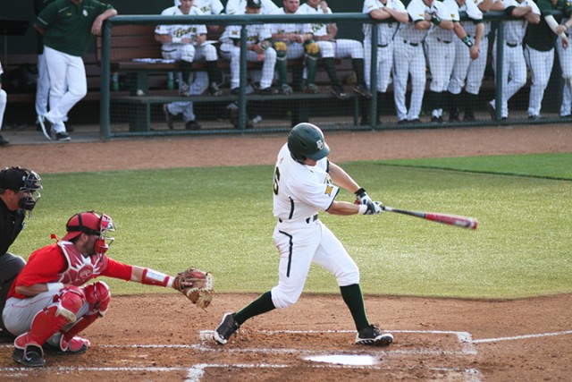Senior outfielder Logan Brown swings during Baylor’s 11-0 loss to Houston on March 31. Brown scored the first of two runs during Baylor’s 2-1 win on Tuesday to Incarnate Word.  Skye Duncan | Lariat Photo Editor