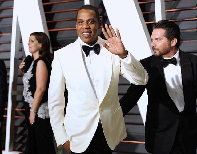 On Feb. 23, Jay-Z arrives at the 2015 Vanity Fair Oscar Party in Beverly Hills, Calif. Tidal, the streaming service co-owned by Jay Z, Rihanna, Madonna and other artists, is inviting more performers to join the company and earn equity.  Associated  Press