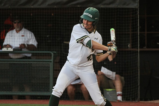 Junior designated player Linsey Hays eyes the ball against Oklahoma State during the Bears 2-1 win on March 27. Baylor was named one of the top 10 schools for Division I college softball by USA Today.  Kevin Freeman | Lariat Photographer
