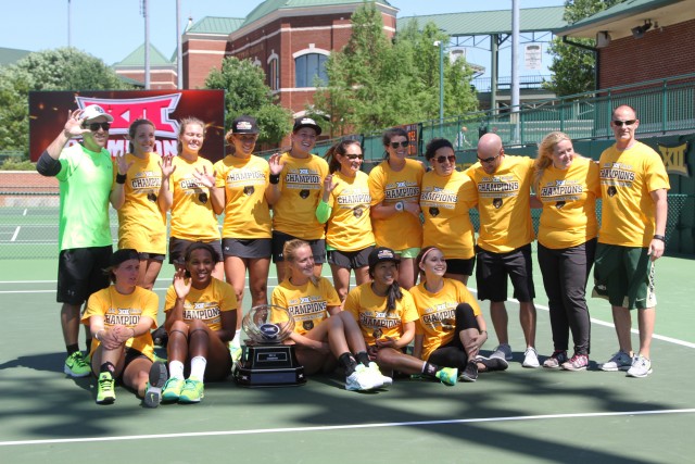 The Baylor Tennis teams pose for a photo after both men and women's tennis claimed Big 12 championship trophies this weekend.