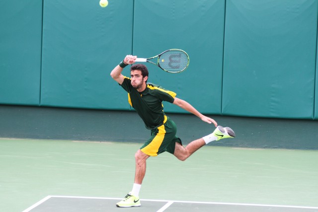 Tchoutakian returns a point during Baylor’s 4-0 win over Oklahoma State on April 12.
