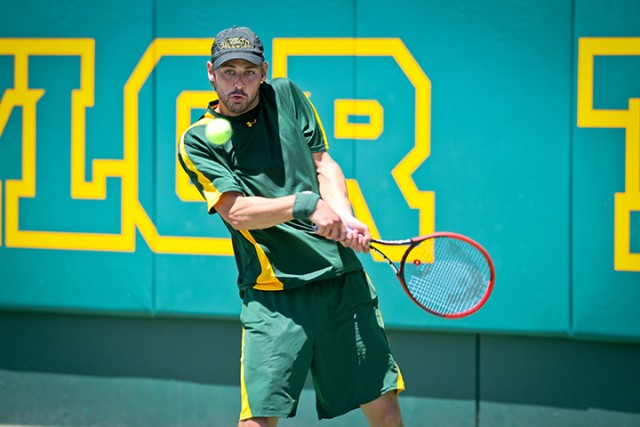 No. 2 junior Julian Lenz returns a serve during Baylor's 4-3 win over No. 6 TCU on April 25 at the Hurd Tennis Center. Following the team's 2015 NCAA Final Four appearance, Lenz and several key players return in the 2016 season. Jess Schurz | Lariat Photographer
