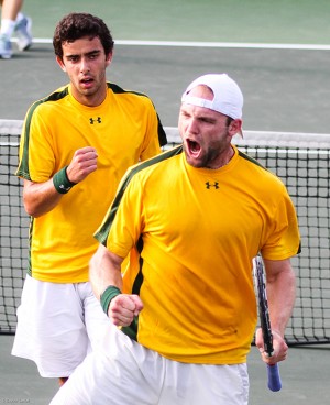 Sophomore Max Tchoutakian (left) and senior Mate Zsiga (right) celebrate a point during No. 2 Baylor's 4-0 shutout over No. 29 LSU Saturday afternoon at the Hurd Tennis Center. The Bears advance to the NCAA Round of 16 for the 14th straight year. Skye Duncan | Lariat Photo Editor