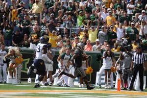 Baylor Wide Receiver Corey Coleman (1) capped off his record setting season with three touchdown catches against WVU. Coleman broke the single season TD record in the second quarter of Baylor's 62-38 win.