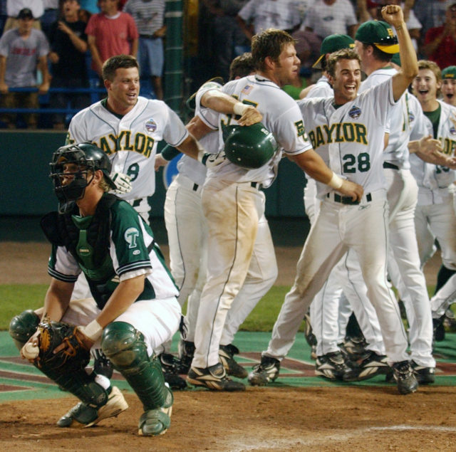 Baylor's Kevin Sevigny, Josh Ford and Sean Walker are joined by teammates to celebrate the Bears' 8-7 walk-off win over No. 1 Tulane as Green Wave catcher Greg Dini kneels at home plate. Photo by Duane A. Laverty | Courtesy of the Waco Tribune-Herald