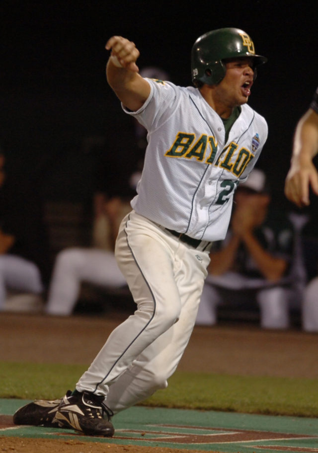 Former Baylor catcher and designated hitter Zach Dillon yells after crossing home plate at Rosenblatt to score the winning run on an error by Tulane second baseman Joe Holland after a hit by BU shortstop Paul Witt. Photo by Duane A. Laverty | Courtesy of the Waco Tribune-Herald