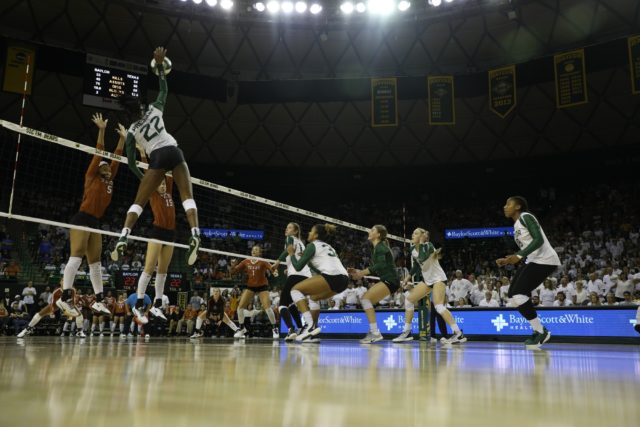 Senior outside hitter Yossiana Pressley makes a hit during Baylor's five-set win over Texas on Nov. 20, 2019 in the Ferrell Center. Pressley was named Big 12 Offensive Plyer of the Week for the second time this season after combining for 31 kills across two matches against West Virginia. Baylor Roundup