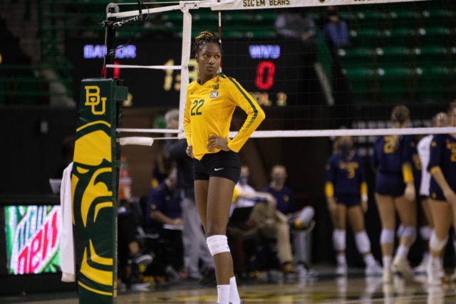 Baylor senior outside hitter Yossiana Pressley gets ready to face West Virginia during Baylor’s 3-1 win on Thursday. Pressley was named Big 12 Offensive Player of the Week for her 31 kills over two matches. Brittney Matthews | Photo Editor