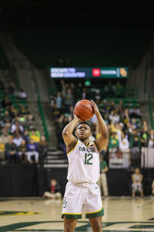 Baylor junior guard Moon Ursin shoots a free throw after being fouled during Baylor's 83-62 2019 victory over Iowa State at the Ferrell Center. Brittney Matthews | Photo Editor