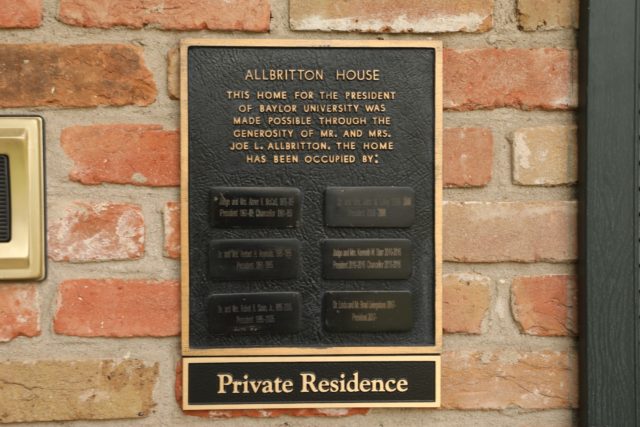 Each resident of the house gets to add their name to a plaque displayed on the front porch.