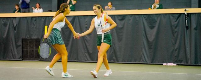 The duo of freshman Brooke Thompson (left) and sophomore Hannah Pinto (right) got things started with a 6-2 win to help Baylor secure the doubles point against Tyler Junior College in an exhibition match Sunday afternoon at Hawkins Indoor Tennis Center.
Photo courtesy of Baylor Athletics