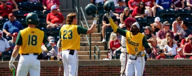 Sophomore infielder Tre Richardson (right) went 4-of-4 at the plate, one double short of the cycle, and notched a career-high five runs on Sunday against Oklahoma at L. Dale Mitchell Park in Norman, Okla. Photo courtesy of Baylor Athletics