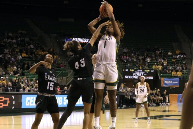 NaLyssa Smith takes a jump shot on March 18 against Hawaii