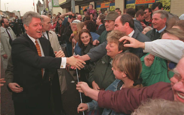 President Bill Clinton shakes hands with the people of Ireland during his first visit to the country in 1995. Photo courtesy of Luke Frazza (AFP)