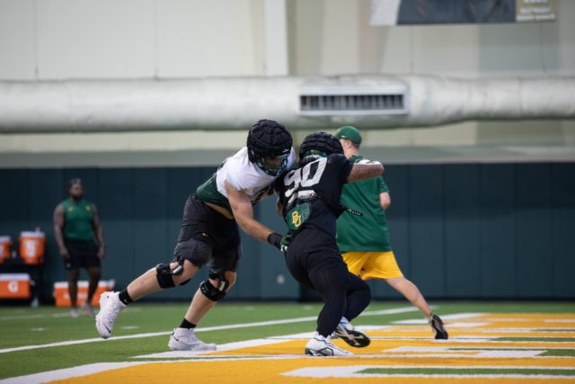 Hall stands out among his teammates and sets a standard that they want to reach. Photo courtesy of Baylor Athletics.