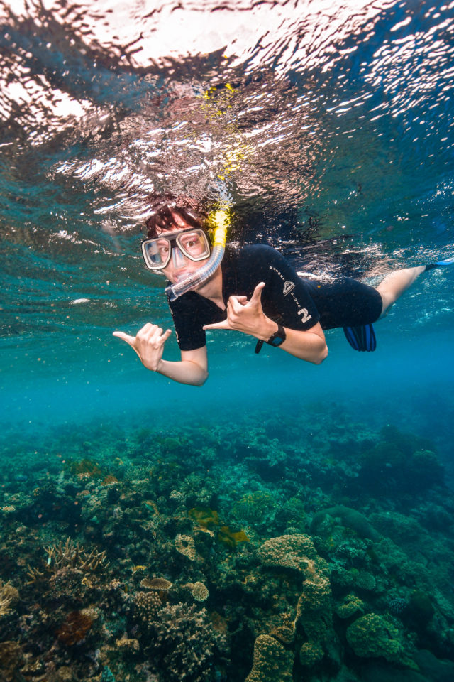 Casey Davis snorkeling in the Great Barrier Reef in Australia.