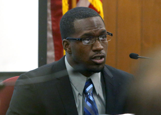In this photo taken on Thursday, Aug. 20, 2015, Sam Ukwuachu takes the stand during his trial at Waco�s 54th State District Court, in Waco, Texas. The one-time All-American who transferred to play football at Baylor University has been convicted of sexually assaulting a fellow student athlete in 2013.  (Jerry Larson/Waco Tribune-Herald via AP) MANDATORY CREDIT