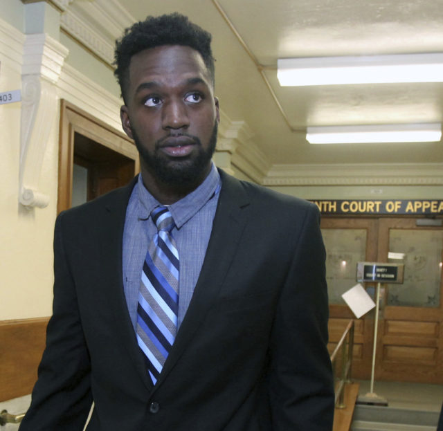 FILE - In this March, 1, 2017 file photo, former Baylor football player Sam Ukwuachu leaves the 10th Court of Appeals following arguments in Waco, Texas. An appeals court has overturned the conviction of the former Baylor football player whose case helped give rise to the sexual assault scandal that engulfed the nation's largest Baptist school. The Texas 10th Court of Appeals said in a ruling Wednesday, March, 22, 2017, that text messages should not have been excluded from the testimony in Sam Ukwuachu's 2015 trial. (Jerry Larson/Waco Tribune Herald via AP, File)