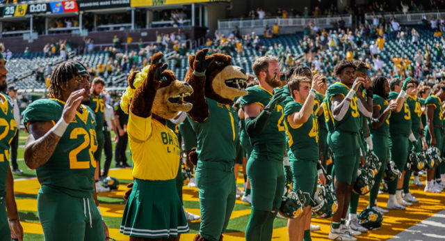 Baylor athletes sing "That Good Old Baylor Line" following a 35-23 win over the University of Kansas on Oct. 22, 2022 at McLane Stadium.
Kenneth Prabhakar | Photographer