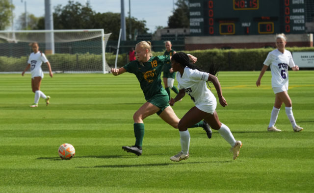 Senior forward Elizabeth Kooiman dashes past a Horned Frog defender in a conference match against No. 12 Texas Christian University on Oct. 23, 2022 at Betty Lou Mays Field. 
Olivia Havre | Photographer