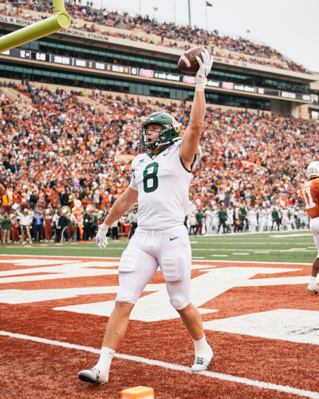 Fifth-year senior tight end Ben Sims celebrates his 14-yard touchdown reception in the second quarter of a conference game against No. 23 University of Texas on Nov. 25, 2022 at Darrell K. Royal Memorial Stadium in Austin. 
Josh McSwain | Roundup Editor-in-Chief