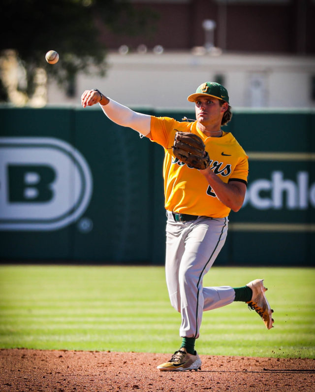 Junior middle infielder Cole Posey makes a throw in the infield during a fall team practice on Oct. 18, 2022 at Baylor Ballpark.
Kenneth Prabhakar | Photo Editor