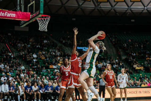 Fifth-year senior forward Caitlin Bickle (51) makes a contested jump shot during a conference game against No. 25 University of Texas on Jan. 22, 2023, in the Ferrell Center.
Kenneth Prabhakar | Photo Editor