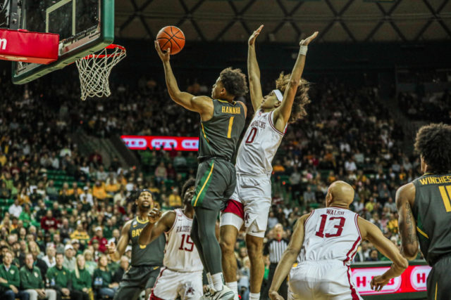 Freshman guard Keyonte George (1) skies forward for a left-handed layup during a Big 12/SEC Challenge game against the University of Arkansas on Jan. 28, 2023 in the Ferrell Center.
Kenneth Prabhakar | Photo Editor