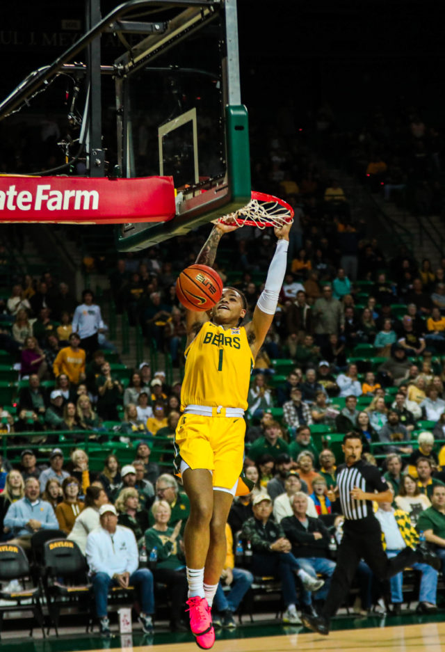 Freshman guard Keyonte George (1) slams down a dunk during a non-conference game against Norfolk State University on Nov. 11, 2022, in the Ferrell Center.
Kenneth Prabhakar | Photo Editor