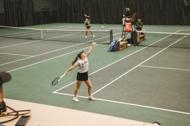 Sophomore Anita Sahdiieva launches her serve toward the opponent during the H-E-B Invite on Oct. 28, 2022, in the Hawkins Indoor Tennis Center.
Assoah Ndomo | Photographer