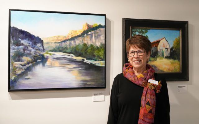 Melanie Stokes with her work in Art a la Cart.
Olivia Havre | Photographer
