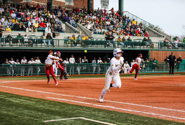 Sophomore infielder Amber Toven (36) tries to beat the throw from the Sooner pitcher during a game against No. 1 University of Oklahoma as part of the Getterman Classic, Sunday, Feb. 19, 2023, at Getterman Stadium.
Kenneth Prabhakar | Photo Editor