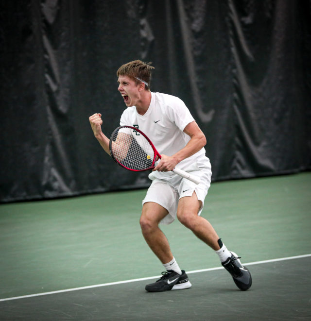 Sophomore Ethan Muza gets fired up after winning a point during a non-conference match against No. 3 Texas Christian University, on Feb. 8, 2023, in the Hawkins Indoor Tennis Center.
Kenneth Prabhakar | Photo Editor