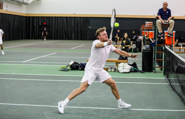 Senior Finn Bass tries to kill the ball downward during a non-conference match against No. 3 Texas Christian University, on Feb. 8, 2023, in the Hawkins Indoor Tennis Center.
Kenneth Prabhakar | Photo Editor