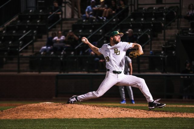 Junior right-handed pitcher Adam Muirhead (29) slings a pitch toward the batter during a non-conference midweek game against Houston Christian University, Tuesday, Feb. 21, 2023, at Baylor Ballpark.
Assoah Ndomo | Photographer