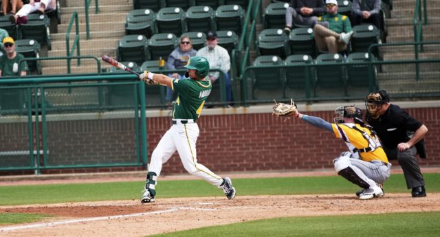 Junior left-handed pitcher and outfielder Kobe Andrade (4) swings at a Chippewas pitch during the final game of a non-conference series against Central Michigan Univeristy, Sunday, Feb. 19, 2023, at Baylor Ballpark.
Olivia Havre | Photographer